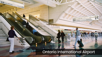 Ontario International Airport escalators, passengers, and ticket counters