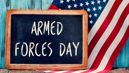 A chalkboard with the words "Armed Forces Day"