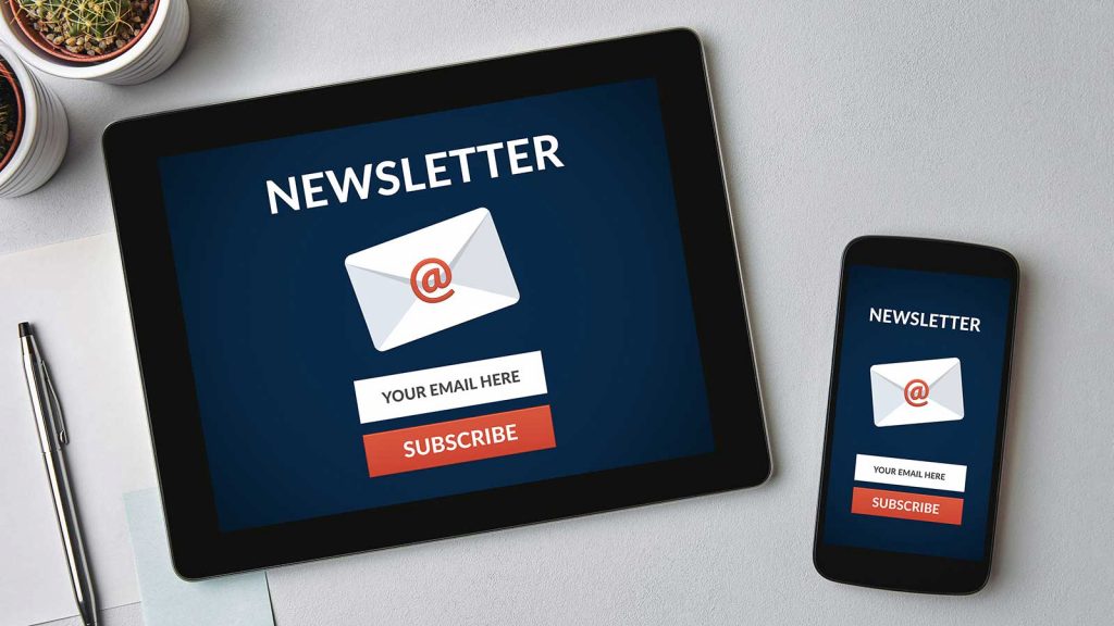 A tablet and phone with a Newsletter subscription link