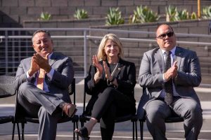 Supervisor Joe Baca, Supervisor Dawn Rowe, and Supervisor Curt Hagman sitting at the opening ceremonies of the new Public Defenders building