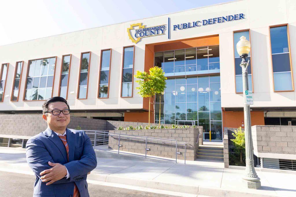 Public Defender Thomas Sone standing in front of the new Public Defenders building