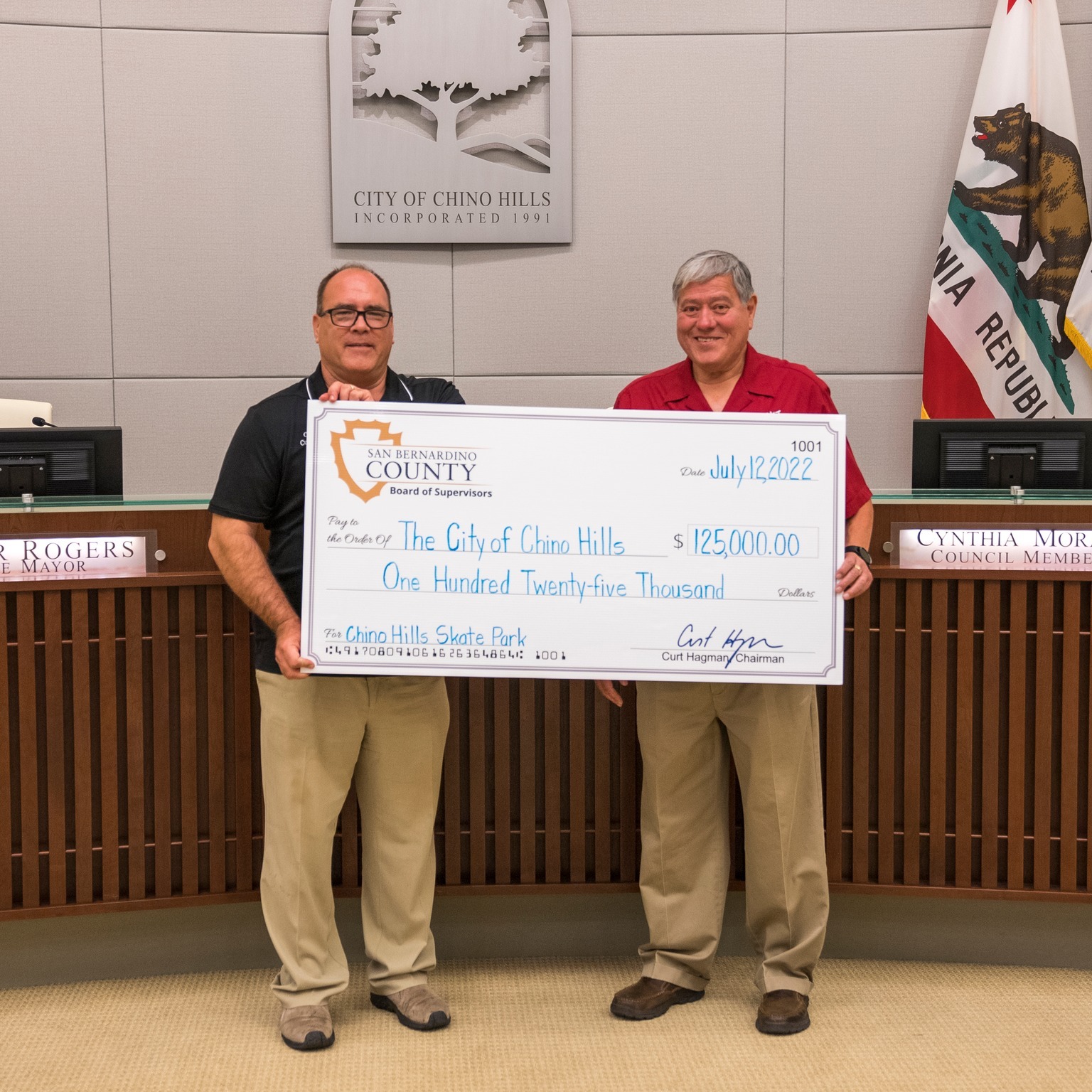 Supervisor Curt Hagman presented a large check to Chino Hills City Council in the amount of $125,000.