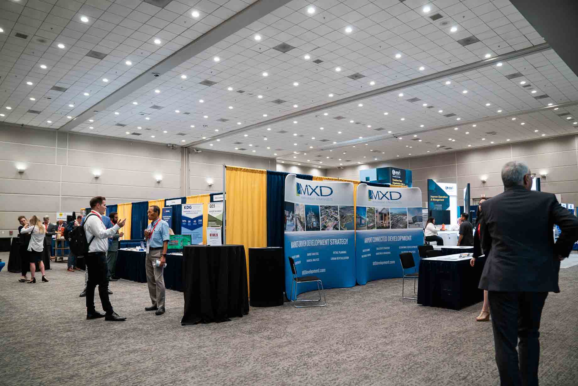 Wide shot of booths at Airport Conference