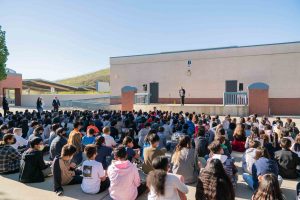 Hidden Trails Elementary students sitting in quad during assembly