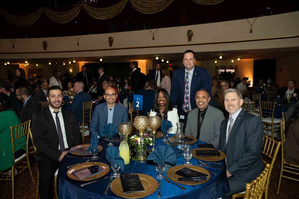 County Leadership Team sitting at a table during the 2024 Public Service Recognition Awards ceremony.