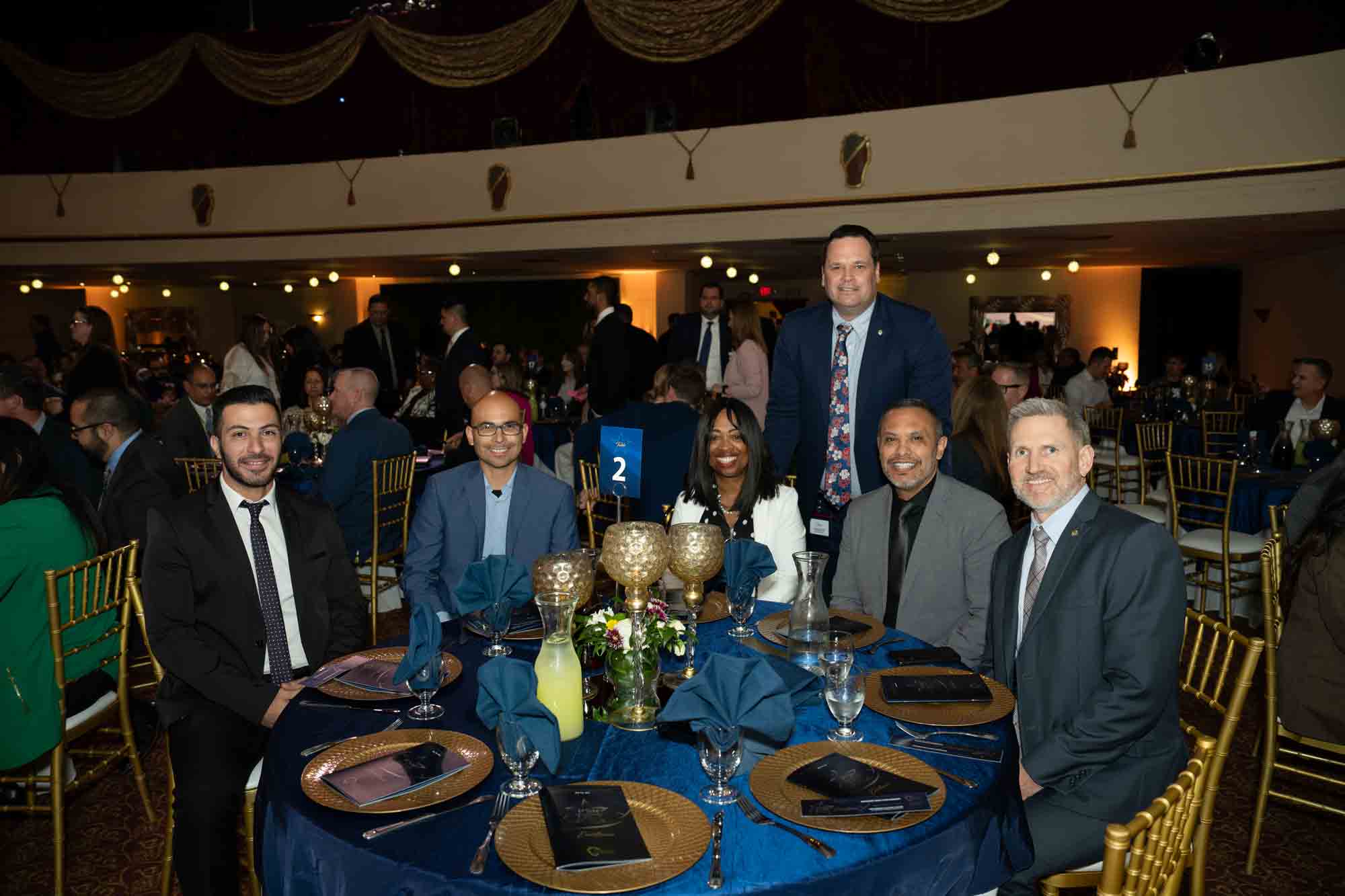 County Leadership Team sitting at a table during the 2024 Public Service Recognition Awards ceremony.