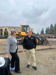 Supervisor Hagman talking with Chino City Manager, Linda Reich.