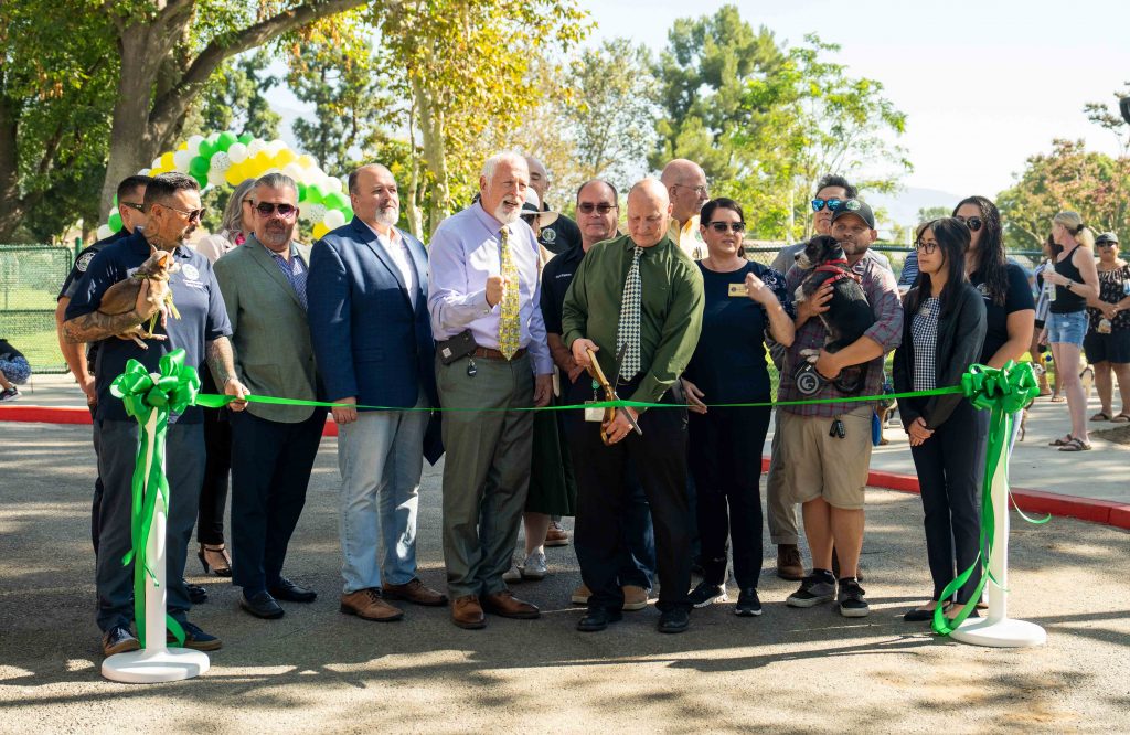 Upland City Council, local elected officials and Upland City Staff cut the ribbon to commemorate the reopening of the Baldy View Dog Park.