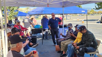 Supervisor Hagman speaking with Veterans at the 2023 Veteran Claims Event.