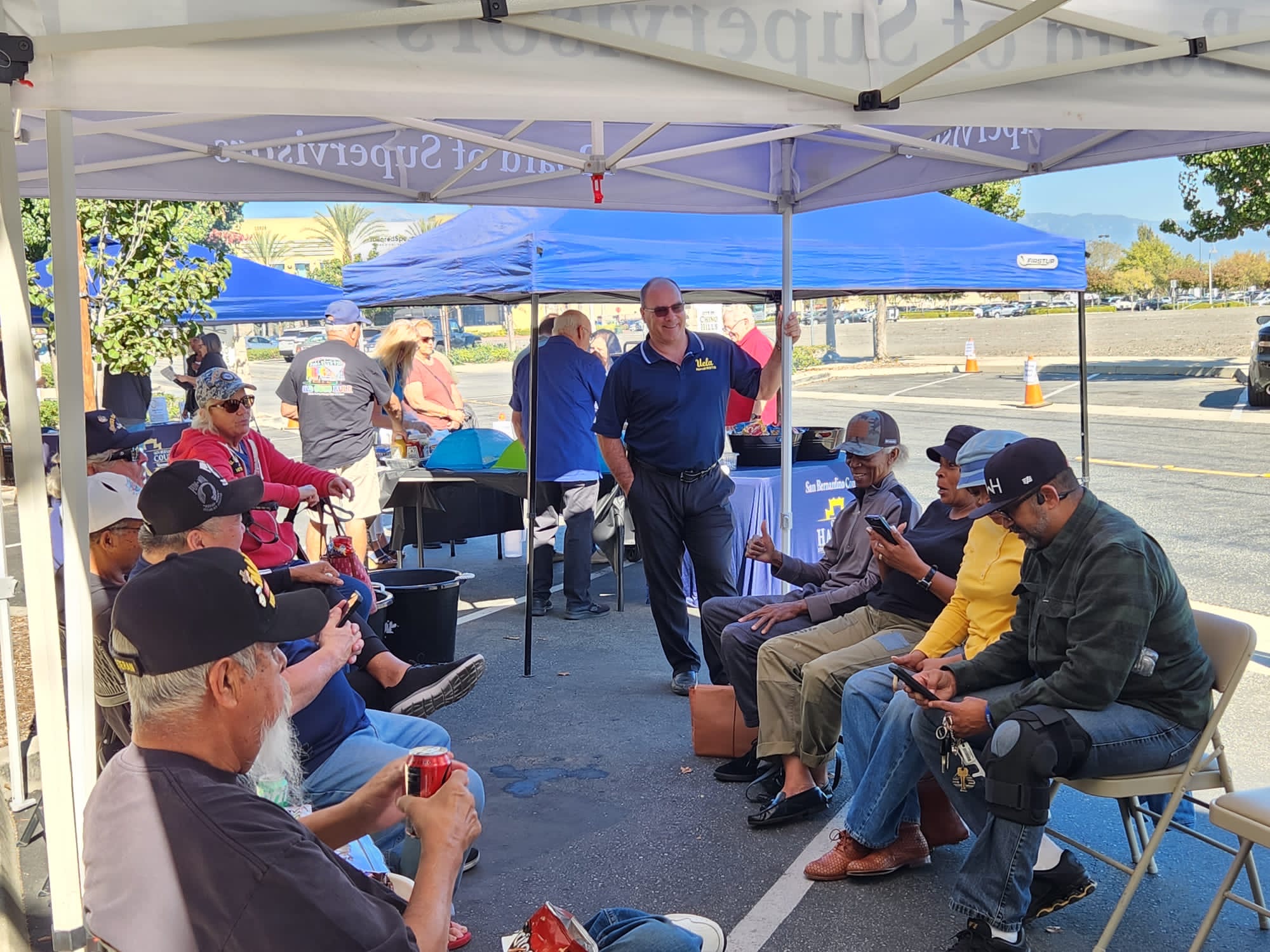 Supervisor Hagman speaking with Veterans at the 2023 Veteran Claims Event.