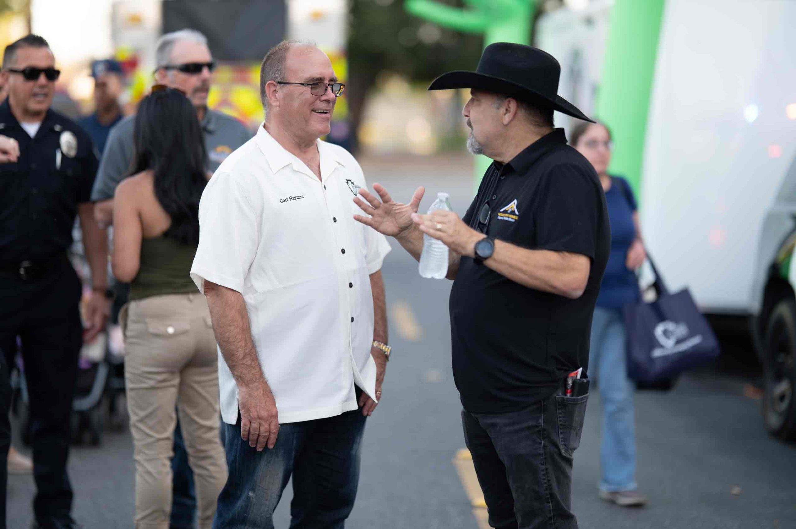 Supervisor Curt Hagman chats with an attendee at the Fourth District Summer Open House event.