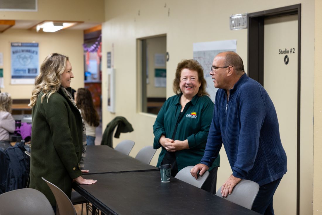 Supervisor Curt Hagman speaks with Councilwoman Debra Porada and Katherine Kolcheva inside a local facility.