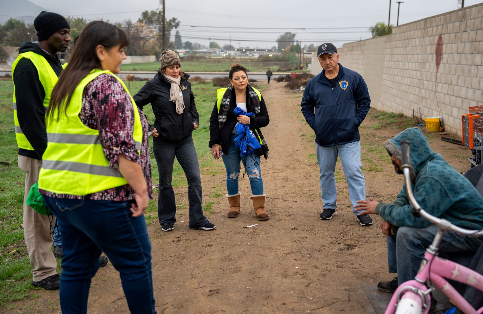 Fifth District Supervisor Joe Baca, Jr. , San Bernardino County Assistant Executive Officer Diane Rundles and county staff engage with a member of the homeless community during the 2024 Point-In-Time Count